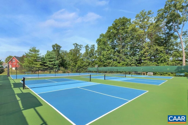 view of sport court with fence