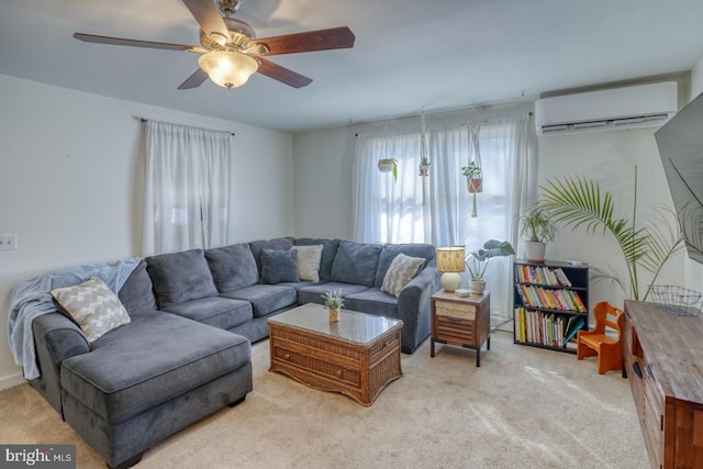 living area with light colored carpet, ceiling fan, and a wall mounted AC