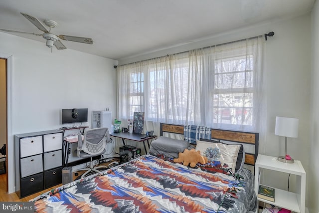 bedroom featuring wood finished floors