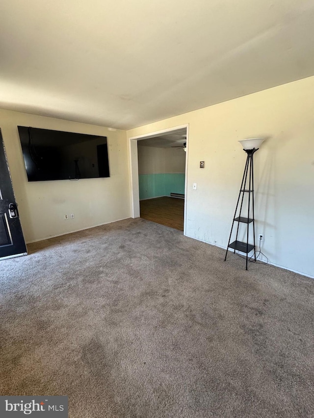 empty room with carpet flooring