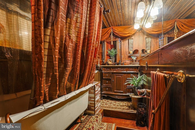 full bathroom featuring wooden ceiling and vanity