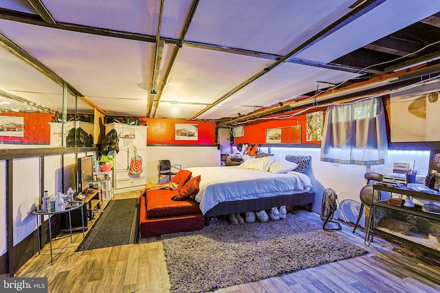 bedroom featuring wood finished floors