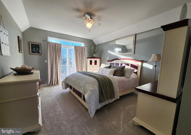 bedroom with lofted ceiling, access to outside, dark carpet, and a ceiling fan