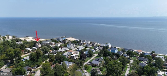 bird's eye view with a residential view and a water view