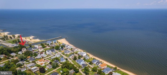 birds eye view of property featuring a water view and a residential view