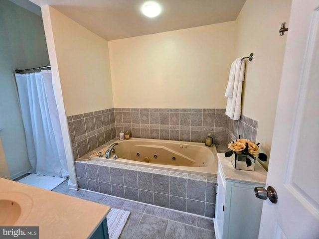 5128 Shore Dr, Huntingtown, MD 20639 - full bathroom featuring a whirlpool tub, vanity, and tile patterned floors