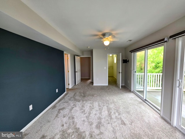 5128 Shore Dr, Huntingtown, MD 20639 - unfurnished bedroom with access to outside, carpet, baseboards, and ceiling fan