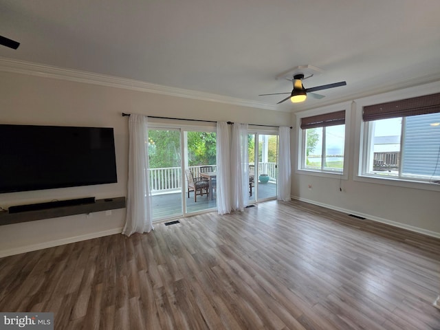 5128 Shore Dr, Huntingtown, MD 20639 - unfurnished living room with a ceiling fan, ornamental molding, baseboards, and wood finished floors