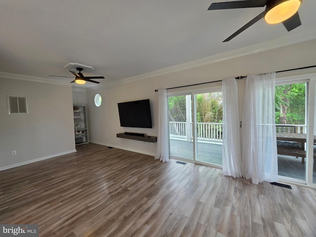 5128 Shore Dr, Huntingtown, MD 20639 - unfurnished living room with a ceiling fan, wood finished floors, ornamental molding, and baseboards