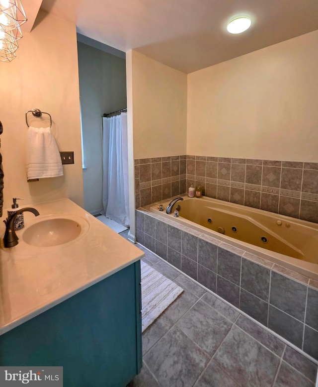 5128 Shore Dr, Huntingtown, MD 20639 - bathroom with a whirlpool tub, tile patterned flooring, vanity, and curtained shower