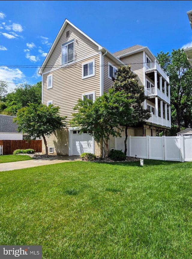 5128 Shore Dr, Huntingtown, MD 20639 - view of property exterior featuring an attached garage and driveway