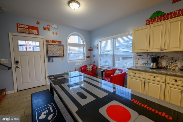 dining area featuring light tile patterned floors