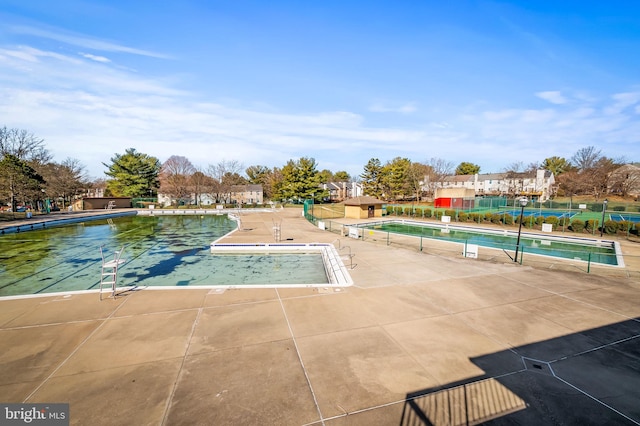 community pool featuring a patio