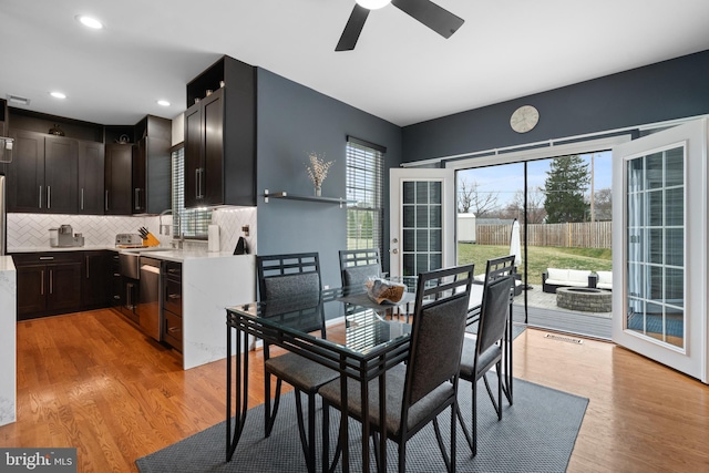 dining space featuring recessed lighting, light wood-type flooring, and ceiling fan