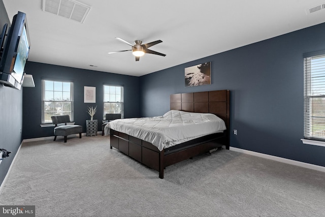 bedroom with visible vents, baseboards, and carpet floors