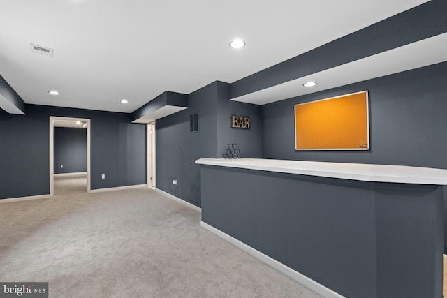 bar featuring baseboards, visible vents, and recessed lighting