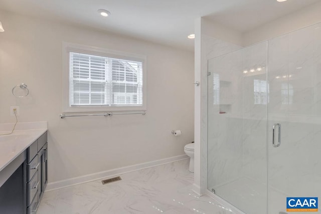 full bath featuring toilet, marble finish floor, a marble finish shower, and baseboards