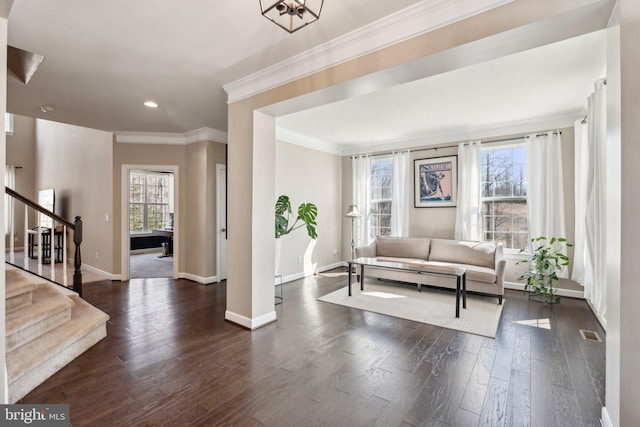 interior space with baseboards, dark wood finished floors, stairway, crown molding, and recessed lighting