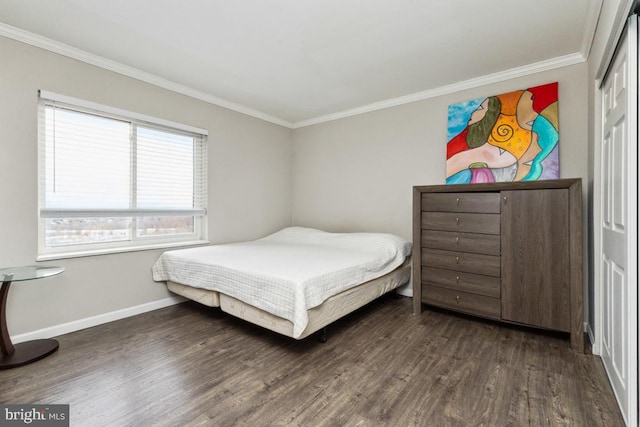 bedroom with baseboards, ornamental molding, and dark wood-style flooring