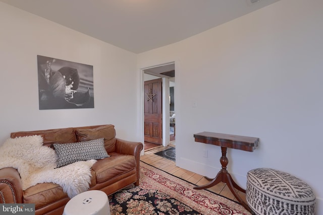 living room with light wood-style floors and baseboards