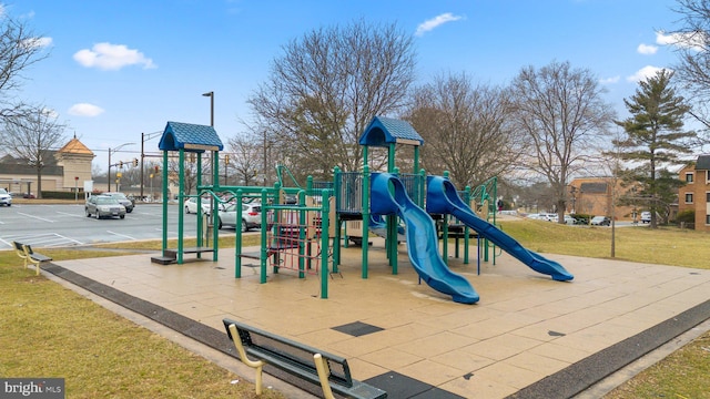 community playground featuring a yard