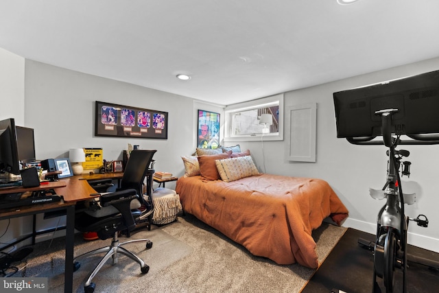 bedroom featuring baseboards