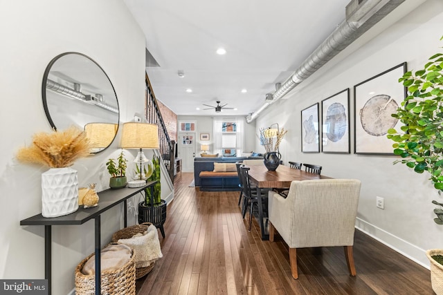 dining space featuring baseboards, hardwood / wood-style flooring, ceiling fan, stairway, and recessed lighting