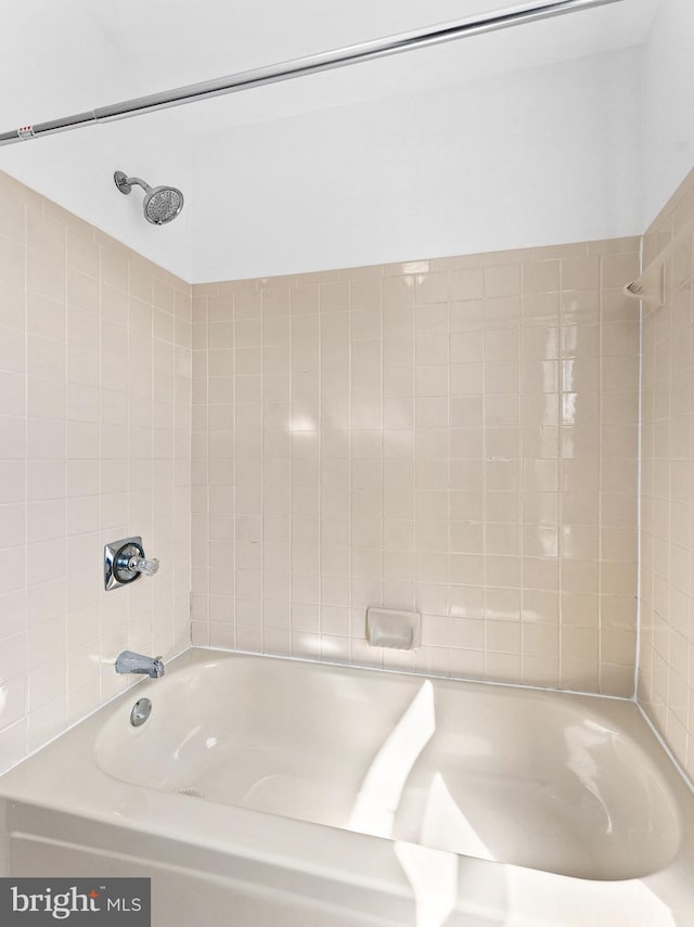 full bathroom with shower / tub combination