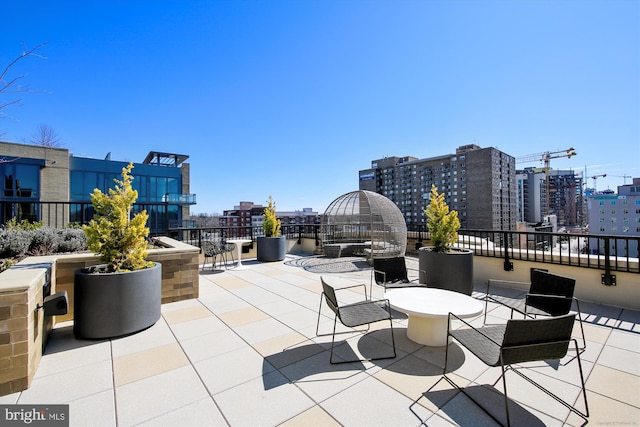 view of patio / terrace with a city view