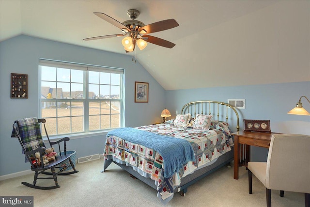 carpeted bedroom with lofted ceiling, visible vents, ceiling fan, and baseboards