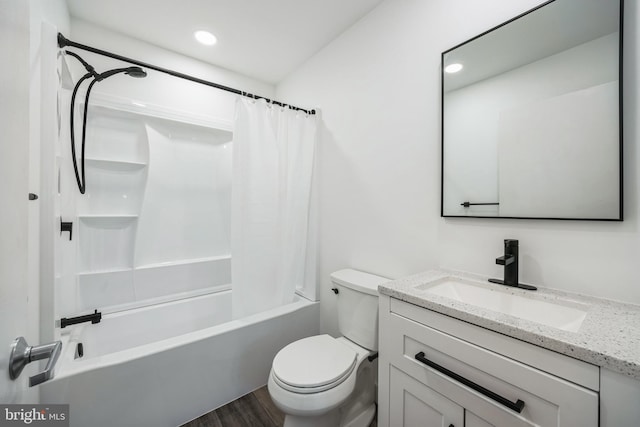 full bath with recessed lighting, toilet, shower / bath combo, vanity, and wood finished floors