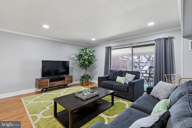 living area with crown molding, recessed lighting, wood finished floors, and baseboards