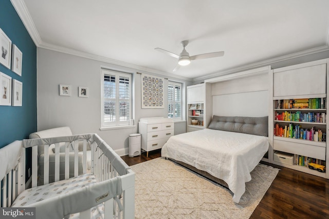 bedroom featuring ceiling fan, baseboards, dark wood-style flooring, and ornamental molding