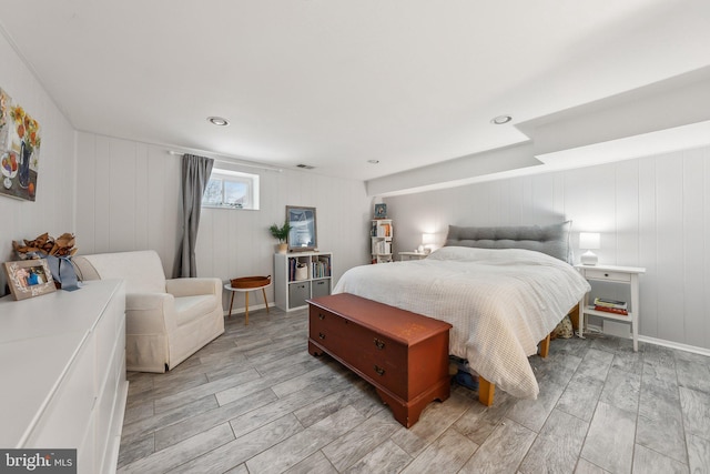 bedroom with visible vents and wood tiled floor