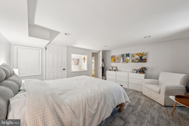 bedroom with wood finished floors