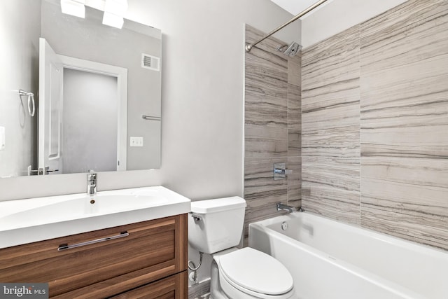 full bathroom with visible vents, shower / tub combination, vanity, and toilet