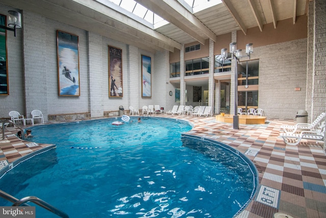 pool with a patio area