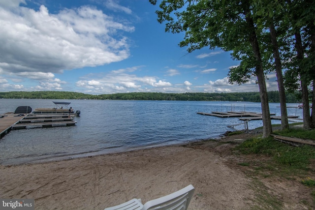 view of dock with a water view