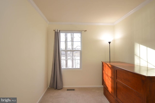 bedroom with light carpet, crown molding, visible vents, and baseboards