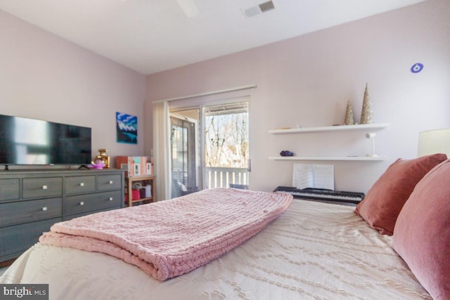 bedroom featuring ceiling fan and visible vents