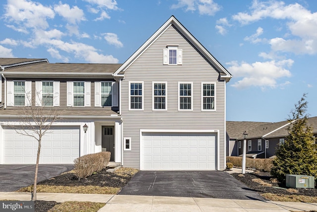 view of front facade with an attached garage and driveway