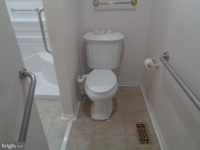 full bath with a shower, tile patterned floors, toilet, and baseboards