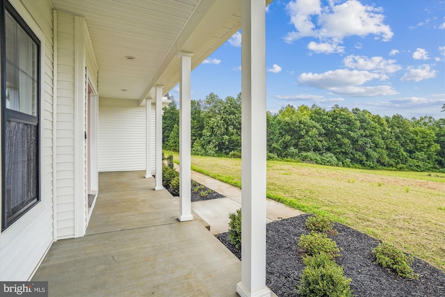 view of patio featuring a porch