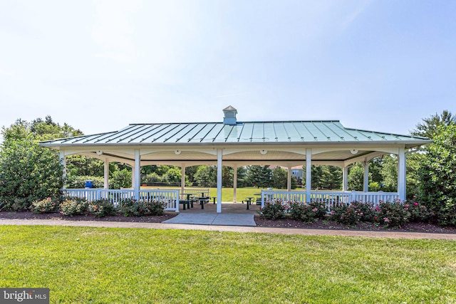 view of community featuring a gazebo and a yard