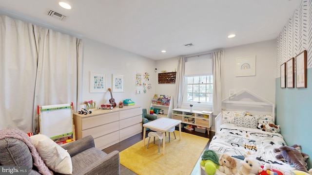 bedroom featuring visible vents and recessed lighting