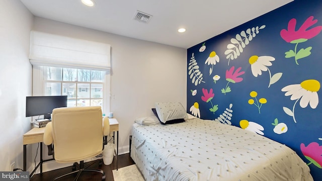 bedroom with recessed lighting, visible vents, baseboards, and wood finished floors