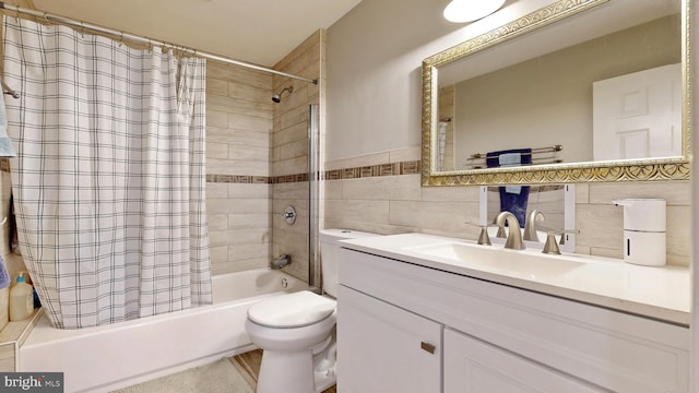 bathroom featuring shower / tub combo with curtain, tile walls, toilet, and vanity