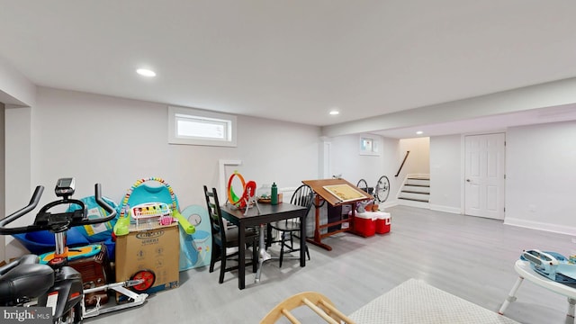 game room featuring recessed lighting, baseboards, and wood finished floors