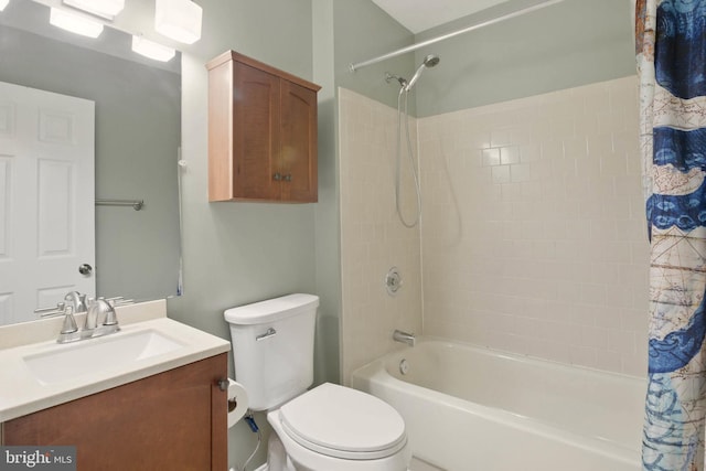 bathroom featuring toilet, vanity, and shower / bathtub combination with curtain