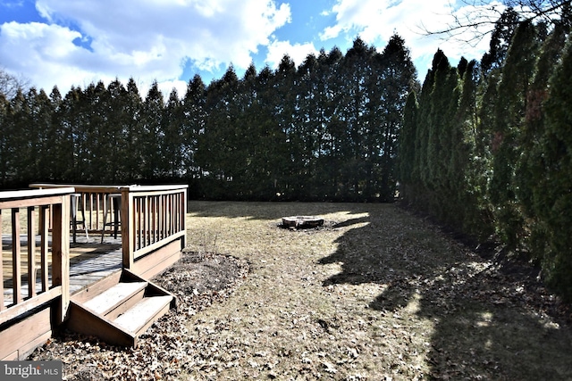 view of yard featuring a deck